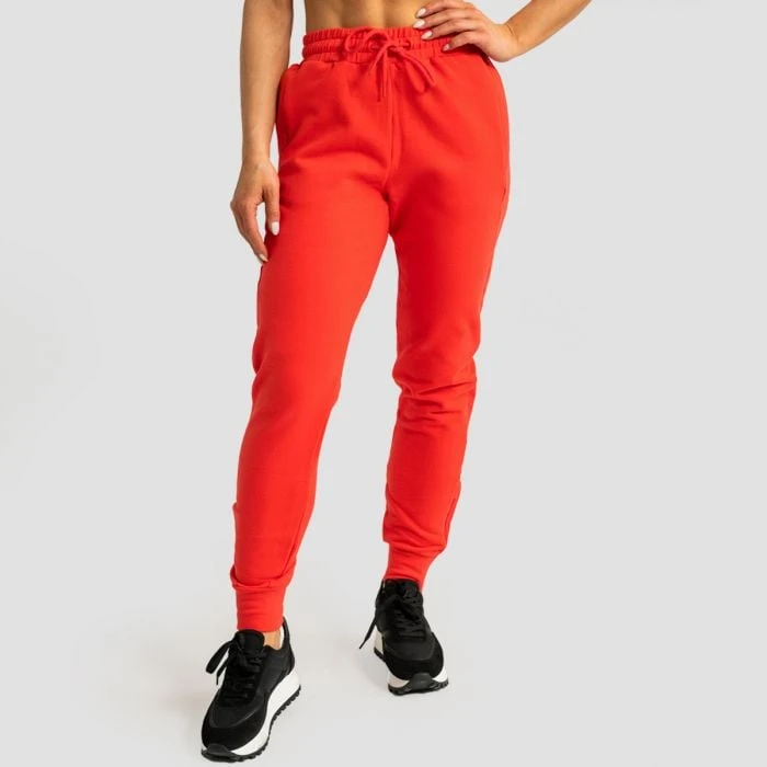 GymBeam Dámske tepláky Limitless Hot Red  MM